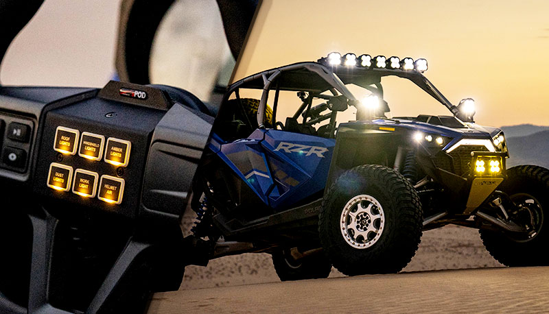 Blue UTV in the desert with steering wheel switch kit